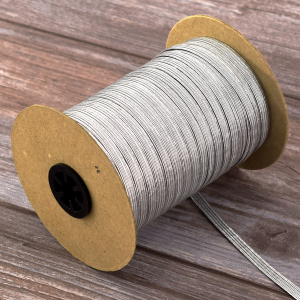 Резинка продежка 6,5 мм, цвет серебристый люрекс. Арт 851146008X6000          