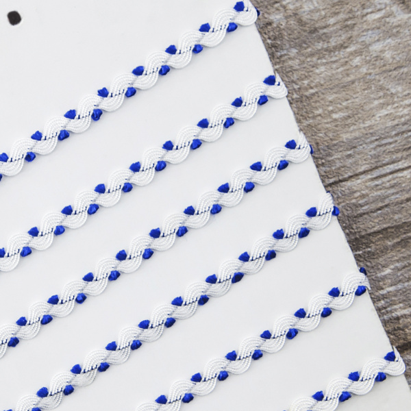 Тесьма PEGA тип вьюнчик, белый с синим, 7 мм. Арт 841512221DA005