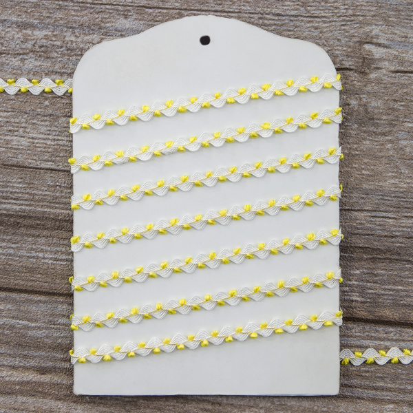 Тесьма PEGA тип вьюнчик, белый с желтым, 7 мм. Арт 841512221DA007