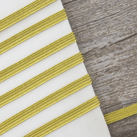 Резинка продежка 6,5 мм, цвет золотистый люрекс. Арт 851146008X7000          