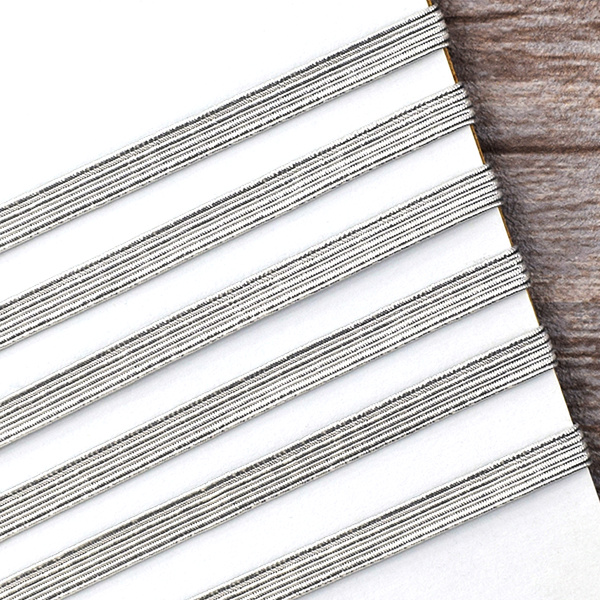 Резинка продежка 6,5 мм, цвет серебристый люрекс. Арт 851146008X6000          