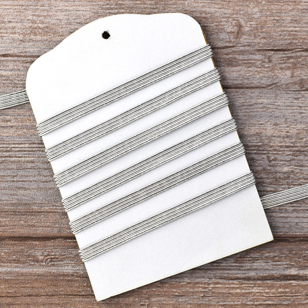 Резинка продежка 6,5 мм, цвет серебристый люрекс. Арт 851146008X6000          