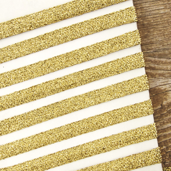 Тесьма PEGA уплощенная с люрексом, цвет золотой, 10,5 мм. Арт 881113929X7000          